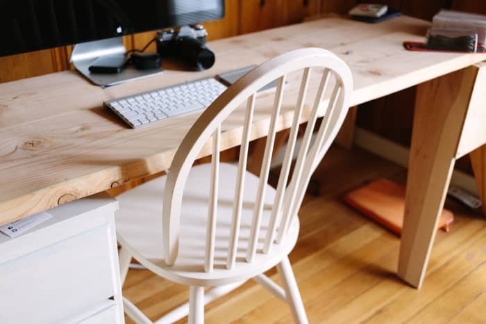 Even if your writing space is a table pushed up against as wall, or tucked into a corner, keeping it clean and tidy will make the space feel less cramped and more spacious.