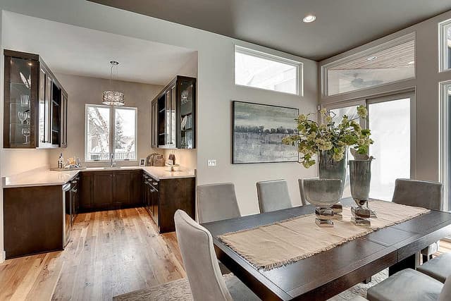 Decide on the table shape based on the space and find comfortable chairs for long, relaxed dinner parties.