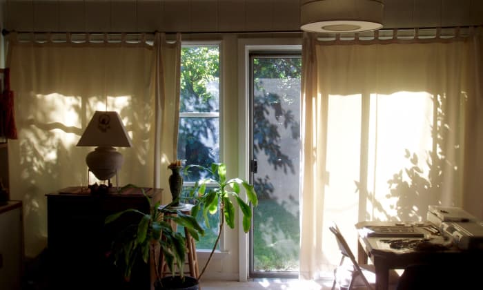 I was surprised by how much these drapes helped cut down the heat. They're also waterproof, so spraying the back side of them doesn't damage anything (see the spraying section below).
