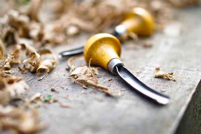 Wood gouges lying on a table.