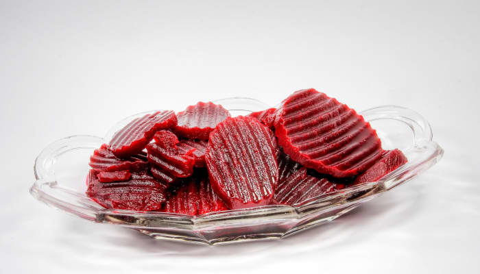 Beets or beetroot can turn urine pink or red. These are pickled beets.