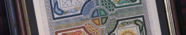 Wash with needlework soap that doesn't leave a residue - prevent running colors and yellowing fabric after it is framed.