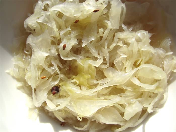 Natural, refrigerated sauerkraut contains probiotics. These potentially helpful bacteria and yeasts may become part of the intestinal flora.