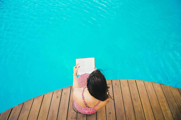 If you have a heavy flow and you don't feel comfortable using a tampon or menstrual cup, there are plenty of other poolside activities you can do.
