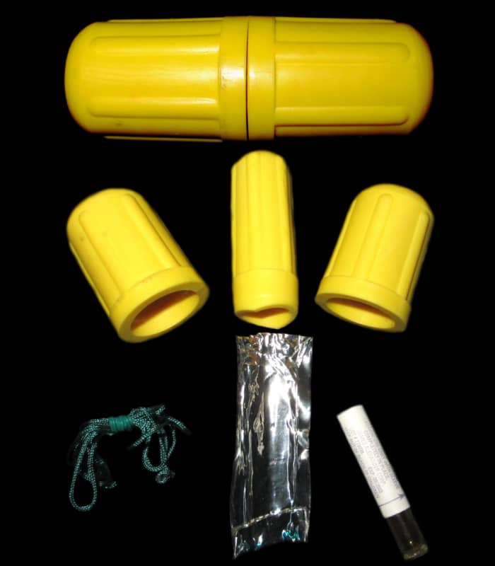 An example of a commercially available kit to treat snakebite. This one consists of three suction devices ("suck"), rope to tie a tourniquet, a scalpel ("drain"), and iodine. NEVER purchase or use these kits, as they always do more harm than good.