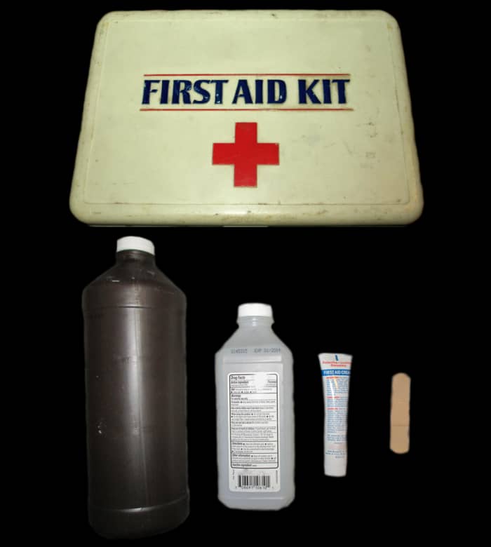 An example of some effective first aid techniques for snakebite: hydrogen peroxide and isopropyl alcohol to cleanse the bite site, antibiotic ointment to smear on the wound, and a bandage to cover/protect the puncture marks.