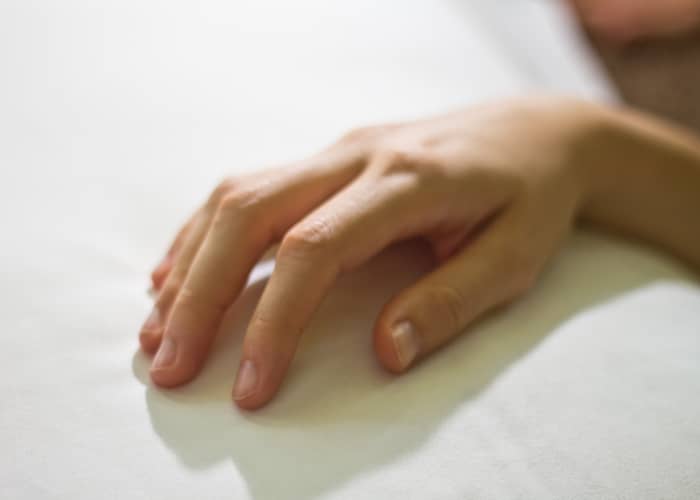Do hand exercises; simple exercises like hand stretches and wrist rotations can significantly improve blood circulation.