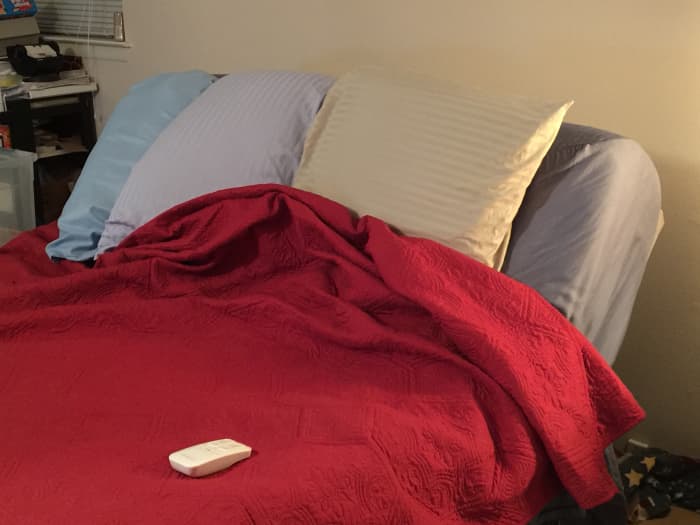 A few years ago I bought an adjustable bed. When I wake up during the night with reflux symptoms, usually coughing, I just raise the head of my bed.