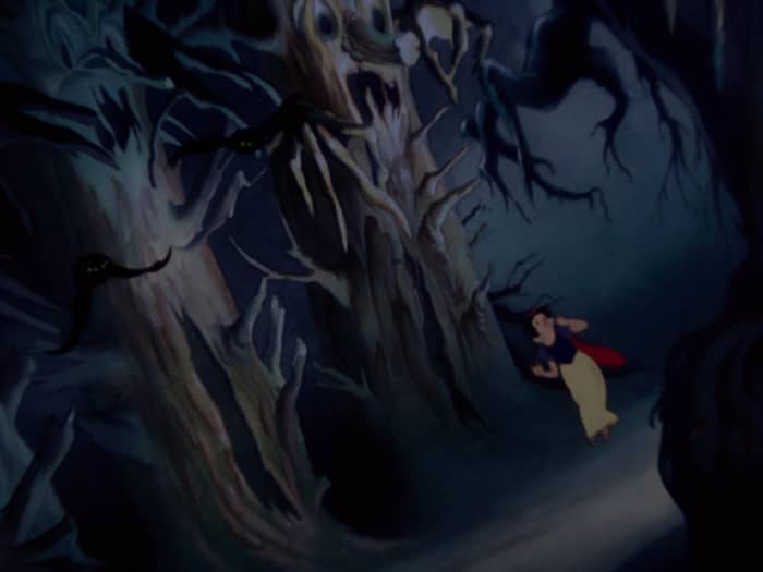 In the dark forest, it seems to Snow that the very trees come to life, each with malevolent faces and grasping hands.