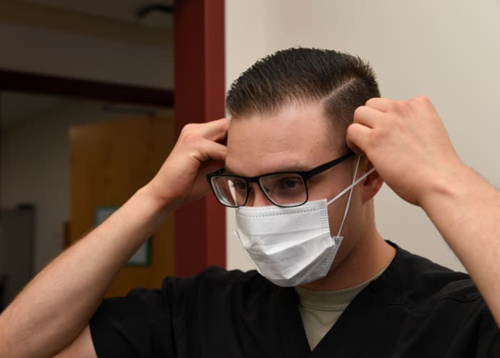Protective gear, including masks and gloves, are recommended to prevent contraction or transmission of coronavirus.