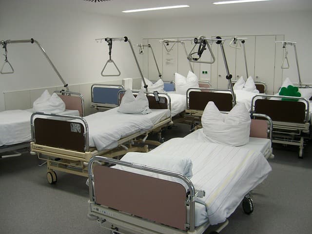Hospitals like to keep beds full by continually treating patients and releasing them—too fast, some say. This can create additional stress for nurses.