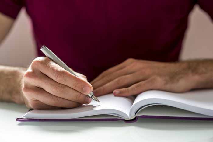 Writing in a journal is a great way to move forward as you start to break free from perfectionism.