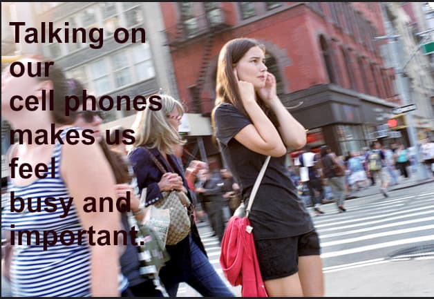 Cell phones are the must-have accessory for those who need to appear busy.