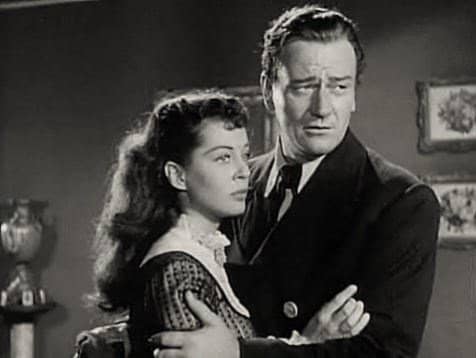 Gail Russell and John Wayne in "Wake of the Red Witch."