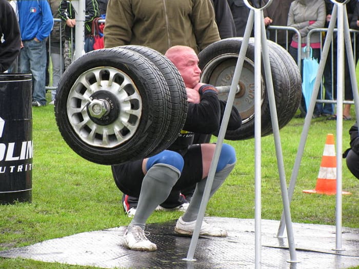 You don't have to take the tires off your car to benefit from doing squats.