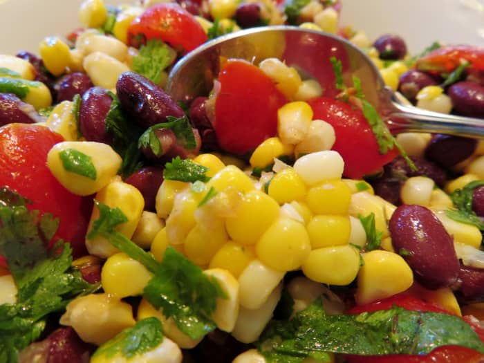 This corn, black bean, and fresh tomato side dish tends to disappear quickly at parties and gatherings.
