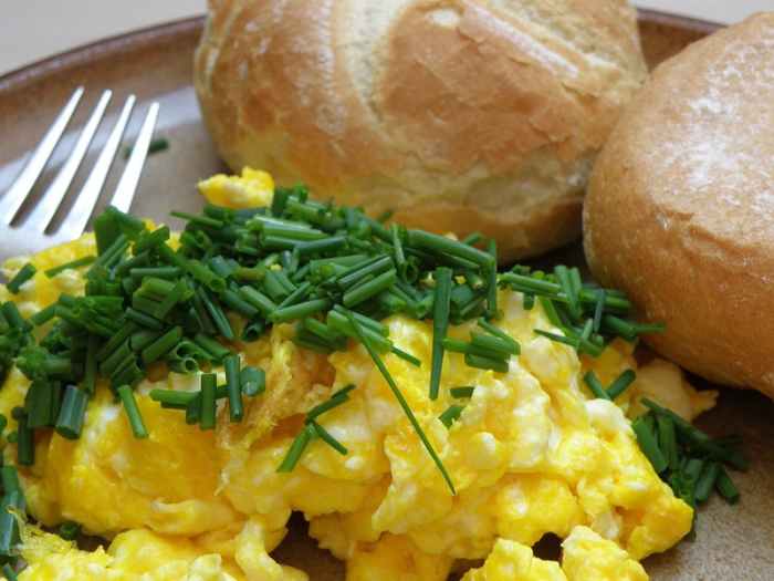 Keep it simple; fluffy scrambled eggs with a chive garnish.