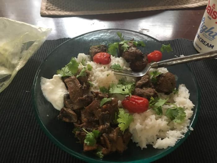 The finished result, alongside cilantro, roasted tomatoes, rice, mushrooms, and sour cream (all of which are optional additions).