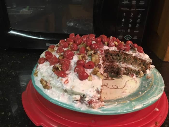 Covered with the cream, filled with the cream, decked with cherries and walnuts... It can make a surprisingly stately dessert. Blackberries might be a good idea as garnish if one has fresh ones.