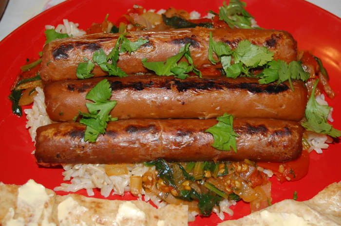 Sausages aren't limited to being eaten in a hotdog bun! Why not try something a little different? I served these Quorn Chicken and Apple Sausages with rice.