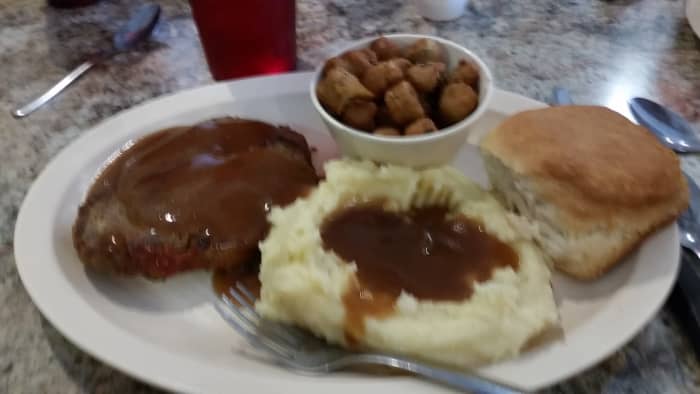 Gravy and more gravy makes the calories add up. Lots of potatoes, a good-sized biscuit, deep-fried vegetables (okra), and a soda, is a good way to pack on the pounds.