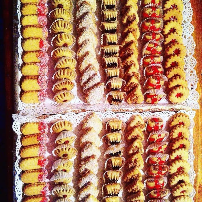 A tray of sweets ready for a wedding. Parties and social gatherings are always well-equipped with platters of sugary delicacies.