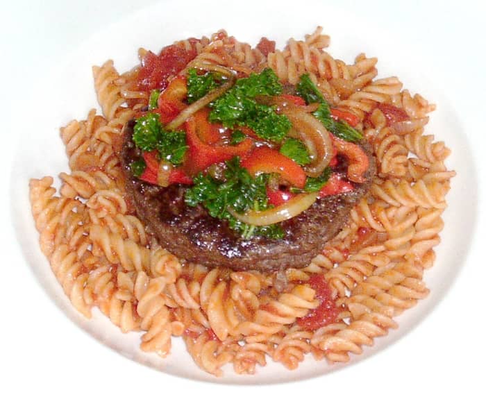 Sauteed kale and bell peppers served with an ostrich burger and fusilli pasta is one of the recipes featured on this page
