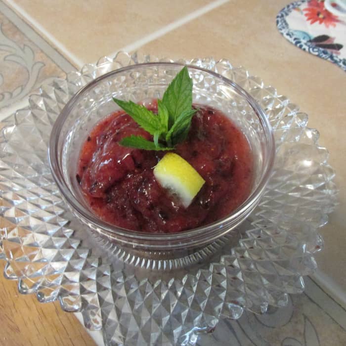 This is a tempting bowl of fresh fruit sorbet with strawberries, blueberries, and grapes!