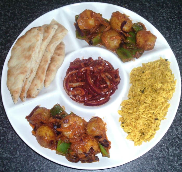 This potato and green bean jalfrezi with turmeric rice, spiced onions, and naan is just one of the recipes featured on this page.