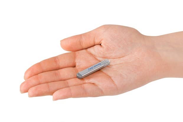 This is the portion that is implanted in the chest. It is about the size of a small flash drive. The heart's activity is stored on this and transmitted using an external device, discussed later.