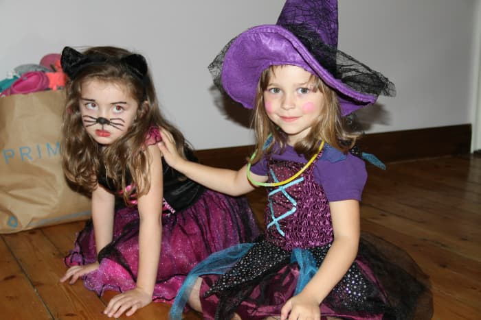 Kids should use non-toxic face paint instead of wearing masks. Hats and headgear should be positioned so that they don't block the child's vision in any way.