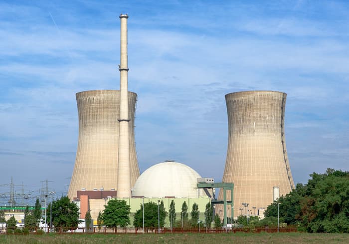 A nuclear power plant in Grafenrheinfeld, Germany. The iconic towers are just for cooling, the nuclear reactor is contained within the spherical containment building.