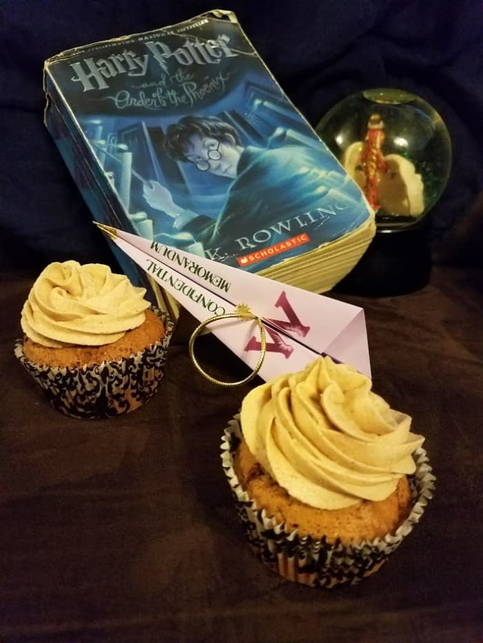 "Have a biscuit, Potter." Book club discussion questions and gingersnap cupcakes with firewhiskey frosting.
