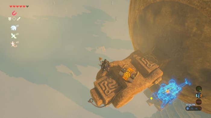 Carefully pull the chest up and rest it on the platform. You can now open the chest.