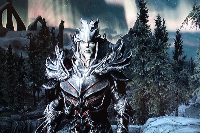 He's decked in a mix of Daedric and Dragon armors.