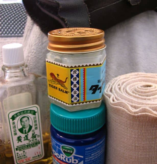 Proactive - tiger balm, ankle and wrist braces and a massage heat pillow - prevention is better than dealing with a pain flare!