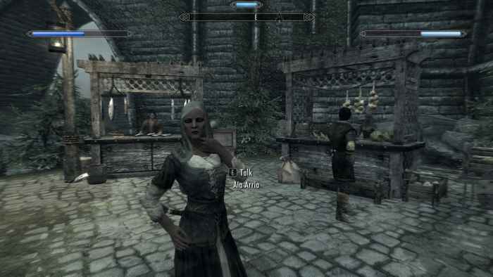 The NPC is now wearing a hood to keep out the rain, added by Wet and Cold an excellent Skyrim mod.