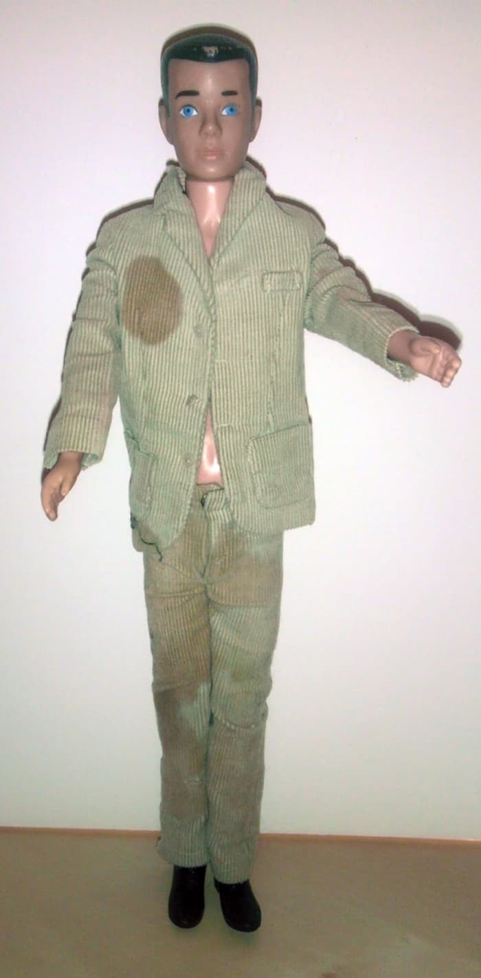 Ken Doll, 1961: Can't you see the desperation on his face? (I thought it was dirt, but I was wrong.) He has been pining for Barbie all these years, to no avail. Maybe he should have dated Midge instead!