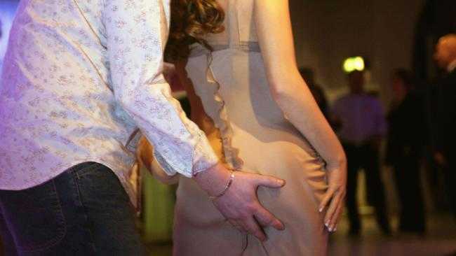 Don't ever grab or intentionally touch a woman's breasts, butt, or other personal area while dancing together. It's very rude and inappropriate.