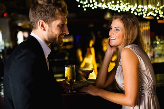 If a woman is clearly on a date with another man, don't go around asking her to dance and interrupting her evening