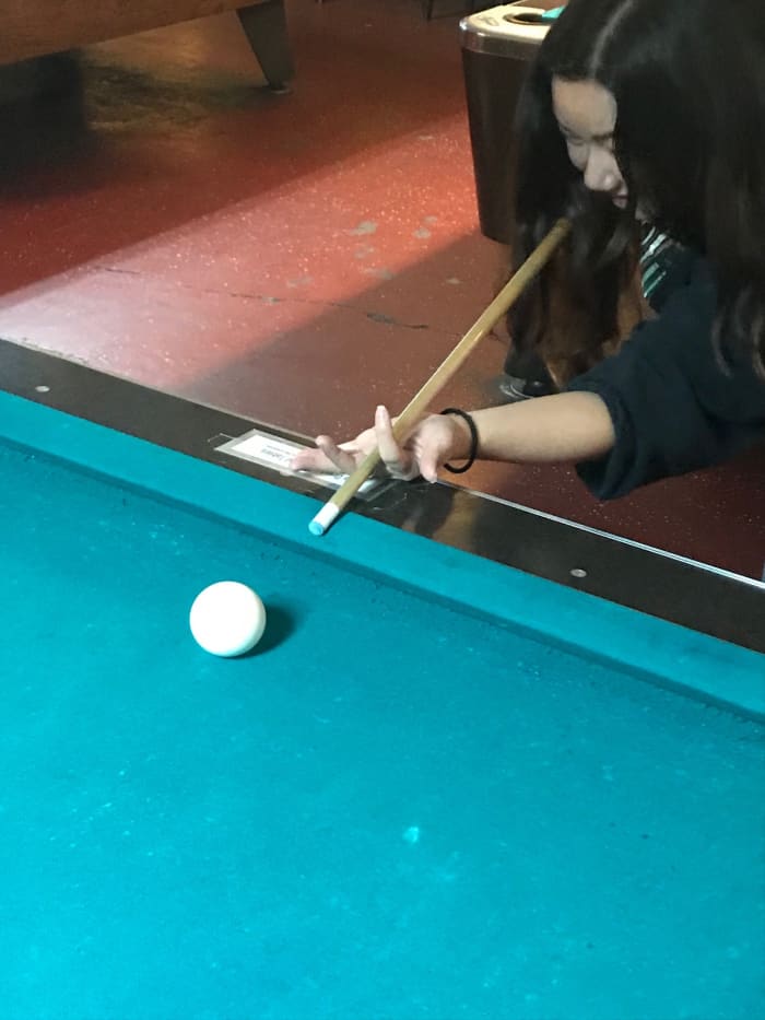I like to call this bridge “The Claw.” It’s awkward and results in a reduced ability to control the aim of the cue.