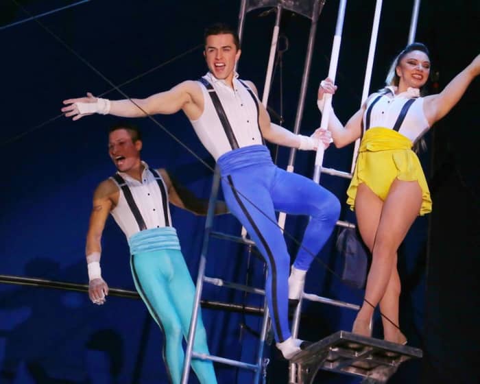 The Flying Tuniziani from left to right: Mauricio Navas, Ammed Tuniziani, Estefani Evans. Not shown here is catcher Adriano de Quadra; Big Apple Circus
