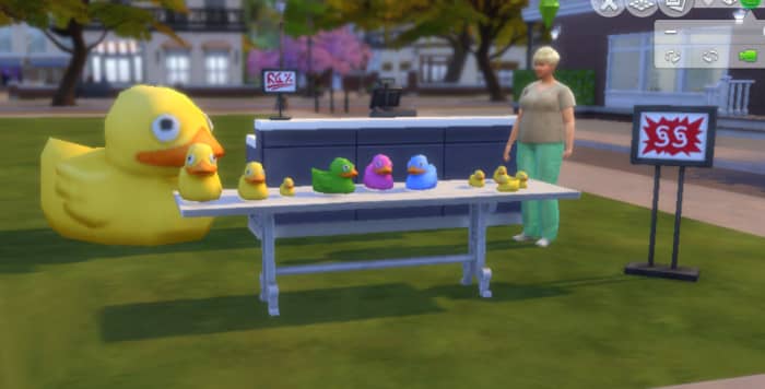 This Sim is operating a simple roadside rubber duck stand. With effort and a little luck, she may own a huge rubber animal emporium one day.