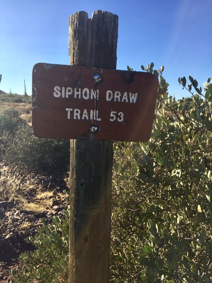 The Siphon Draw Trail leads hikers out of the park and up a continuous but slight grade into the Superstition Mountains.