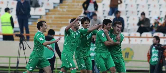 Turkmenistan players celebrate following a goal during a 2018 World Cup qualifier against IR Iran in Dasoguz, Turkmenistan in June 2015.