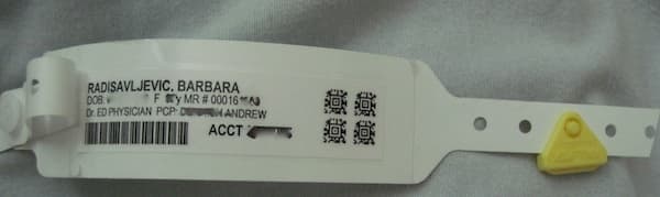 My hospital bracelet. Personal data has been removed for privacy (something you don't have at the hospital).