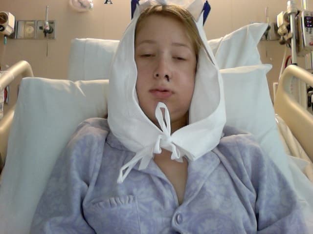In the hospital, one day after surgery, a trickle of dried blood coming from my nose. I feel like my face was so much larger in real life, though.