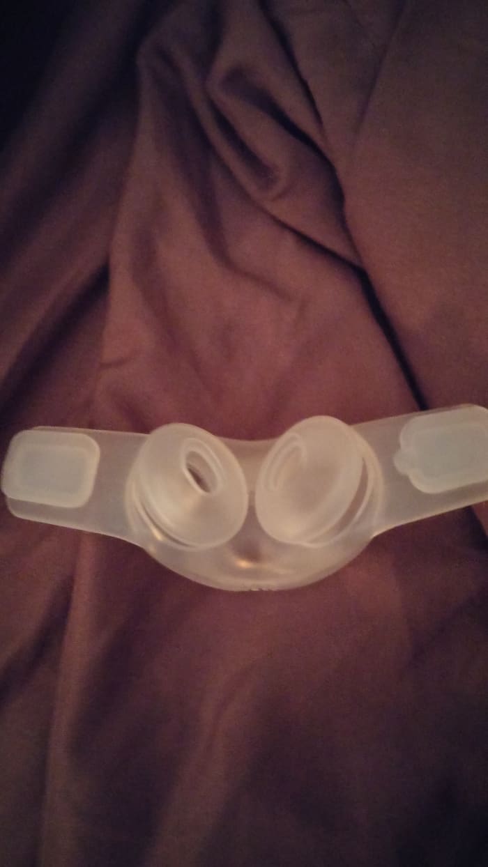CPAP masks are available in a variety of styles. This type is called the "pillows." The 2 oval-shaped pillows fit into the nostrils.