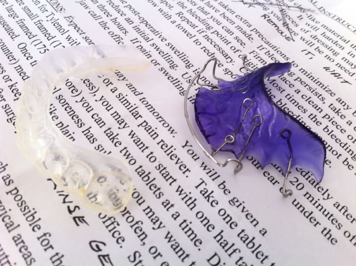 I was relieved to find that my retainers, which I wear at night, were NOT responsible for worsening my gums' condition.