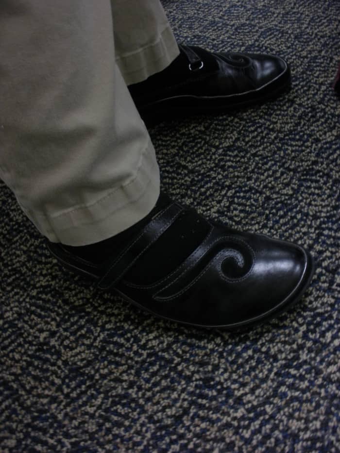 A comfortable pair of shoes that cushions your heels and supports your arches is required.